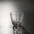 Minimalist hand-blown hammered glass teacup with unique octagonal rim design. - Gold Rim Eight-Window Hammered Cup