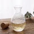 Elegant Japanese glass sake carafe with embossed wave pattern and natural cork stopper - Wave Pattern Sake Pitcher (With Cork) / With Cork