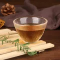 Elegant Japanese style hammer texture glass tea cup filled with tea on wooden mat. - Style 23 (KB001)