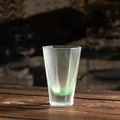 Elegant frosted octagonal glass tea cup featuring a subtle green gradient base design - Octagonal Frosted Fragrance Cup / Glazed Green