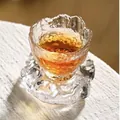Premium handcrafted textured glass tea cup with matching saucer featuring ice-like rock design - Cup and Coaster Set / Clear