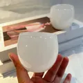 Minimalist white translucent glass kung fu tea cup with an elegant jade-like smooth finish - Egg Style Cup / 1 Piece / Jade White