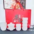 Elegant white jade Kung Fu tea set gift box including gaiwan, cups, and a pitcher - White Jade Drum Cup 9-Piece Set