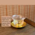 Eleganter Gaiwan-Teebecher aus Kristallglas mit Goldrand und handgemaltem Bambusmuster - Bambus-Gaiwan mit Gold-Untersatz / Bambus + Gold-Untersatz