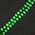 Perle tonde in pietra occhio di gatto verde smeraldo per la creazione gioielli DIY - Verde