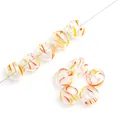 Hand-painted hollow glass bubble beads with vibrant orange and yellow flame patterns - Peach Cyclone