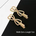 Golden bow-shaped duckbill hair clip for DIY accessories, measuring 2cm wide and 7cm long - Gold Bowknot Style