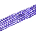 Multiple strings of dark blue flat round lampwork evil eye glass beads for DIY jewelry - Sapphire Blue