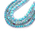 Light blue faceted lampwork beads with rose floral patterns for DIY jewelry making - Lake Blue