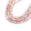 Faceted glass rondelle beads with pink rose floral pattern for DIY necklace making - White with Blue