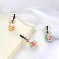 Miniature glass bottle charms with colorful fruit slices for handmade DIY jewelry making - Multicolor