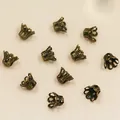 Calottes de perles filigranes bronze vintage pour la création de bijoux DIY - 4x5mm (40 Pièces/Paquet) / Bronze