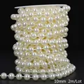 Macro view of 10mm cream ABS imitation pearl chain beads for DIY wedding bouquet decor - Round Style / 10mm (2 Meters/Pack) / Beige