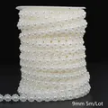 Close-up detail of off-white ABS imitation pearl lace chain, 9mm width in a 5m roll. - Floral Style / 9mm (5m/Pack) / Beige
