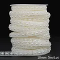 Detailed macro view of 10mm ABS off-white pearl bead chain trim for DIY craft projects - Square Lace Style / Width 10mm (5m/Pack) / Beige