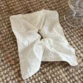 Detailed view of white lace scrunchie with delicate floral embroidery texture - 5# Off-White Lace Scrunchie