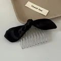 Detailed view of elegant black satin bow hair comb with durable silver metal teeth - Black Bow Hair Comb / Black
