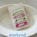 Set of four colorful polka dot and striped hair clips on a white display card. - 11# (Light Green Polka Dot)