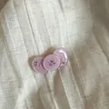 Detail of translucent pink button hair clips with sparkling rhinestone accents - Bow / Pink