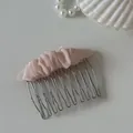 Detailed view of a sweet pink mesh scrunched fabric top on a silver metal hair comb - 4# Pink Mesh Pleated Oval Hair Comb