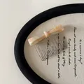Detailed close-up of a pastel marble acetate bow hair comb with elegant metal tines - Hair Comb / White Pink Bow Hair Comb