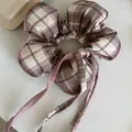 Elegant plaid flower hair scrunchie with long ribbons in brown and pink checkered fabric - White Coffee Striped Pink Edge Ribbon