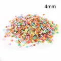 Macro detail of 4mm colorful iridescent flower-shaped sequins for DIY handmade jewelry - Metallic 3D Flower Sequin (4mm/Multi-Color)