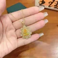 Collana di lusso con pendente a goccia di gemma gialla e aureola floreale dorata - Solo Catena / Giallo