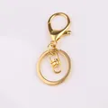Minimalistischer Schlüsselanhänger aus Zinklegierung in Gold mit Karabinerverschluss - Achter-Schnalle / 5 Stück / Gold