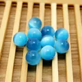 Perle sintetiche occhio di gatto blu chiaro da 12mm per la creazione di gioielli fai da te - 10 Pezzi/Confezione / Blu Lago / 10mm