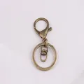 Vintage-Schlüsselanhänger aus Zinklegierung mit Hummerverschluss und stabilem Rundring - Achter-Schnalle / 5 Stück / Antike Bronze
