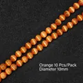 Perle di pietra occhio di gatto arancioni da 10 mm per gioielli fai da te, 10 pezzi - 10 Pezzi/Confezione / Arancione / 10mm