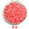 Dreamy pink resin cat-eye beads featuring shimmering starry sky gold sand effect for DIY crafts - Red