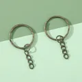 Set di due portachiavi in bronzo antico in metallo con catena a 4 maglie per DIY - Portachiavi con Rilievo da 2.5cm Con Anello / Confezione da 10 / verde antico
