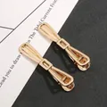 Gouden strikvormige metalen alligator haarklem voor DIY handgemaakte sieraden - Strikclip / Goud