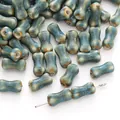 Handmade bone-shaped ceramic beads with blue reactive glaze for DIY jewelry making - 6x12mm (2 Pieces) / Teal