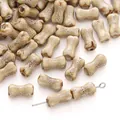 Handmade bone-shaped ceramic beads with mottled brown glaze for DIY jewelry making - Khaki