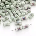 Hand-painted pale green bone-shaped ceramic beads for DIY jewelry making and crafting - 6x12mm (2 Pieces) / Matcha Green