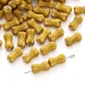 Hand-painted bone-shaped ceramic beads in mustard yellow for DIY jewelry making crafts - Mustard Yellow