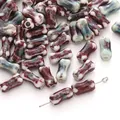 Bone shaped ceramic beads with red and blue variegated glaze for jewelry DIY - Cyan Blue