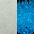 Luminous iridescent white glass bubble beads with bright blue glowing effect for DIY crafts - Beige