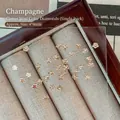 Champagne klavertje vier nageldecoraties met 3D kristallen, afmeting 4x4mm grootte - 4x4mm / Champagne