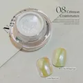 White moonlight nail powder showing a shimmering aurora effect on different bases. - Crimson Face (zqsp1054-08)