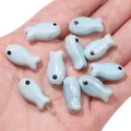 Set of cute light blue ceramic fish beads for handmade DIY jewelry and craft projects - Little Fish (BCD017) / 2 Pieces/Pack (10x19mm) / Light Blue