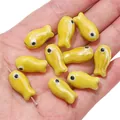 Handmade yellow ceramic fish-shaped loose beads for DIY jewelry making accessories - Little Fish (BCD017) / 2 Pieces/Pack (10x19mm) / Yellow