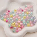 Perles acryliques irisées mixtes dans un plateau floral pour bijoux DIY créatifs. - 10mm (50 pièces/paquet) / Irisé - Couleurs Mélangées Aléatoires