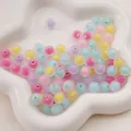 Perles en acrylique givré avec perle intérieure pastel pour création bijoux faits main - 10mm (50 pièces/paquet) / Givré - Couleurs Mélangées Aléatoires