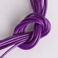 Close-up macro shot of purple 2mm waxed cord for DIY jewelry making and braiding - 1mm 15m/Pack / Deep purple