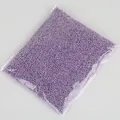Small purple foam beads in a transparent plastic bag for DIY crafts and filling. - Approx. 8000 Pieces / 2-4mm / Purple