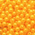 Macro detail view of high-gloss orange ABS faux pearl beads featuring straight holes - 8mm / Gold Yellow